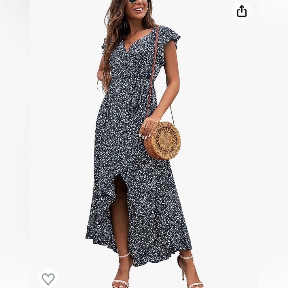 Black flowered High low dress with green accents.